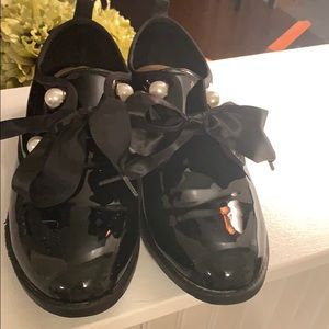 Black patent leather flats